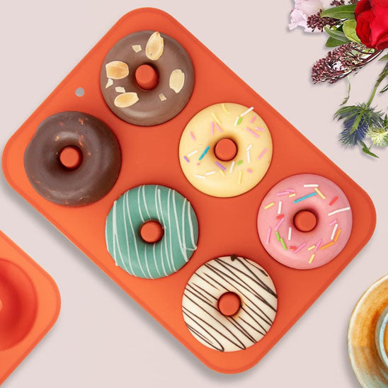 moules silicone couleur orange avec donuts
