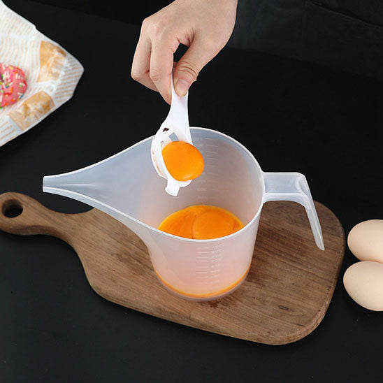 oeuf dans verre doseur