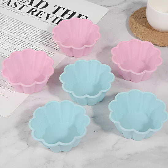 trois moule a muffin couleur rose bleu