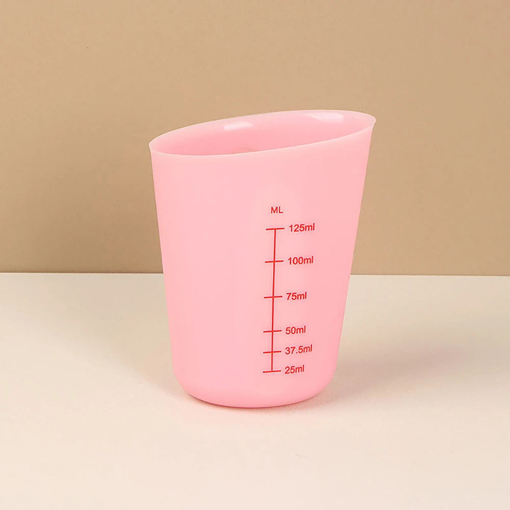 verre mesureur rose petit