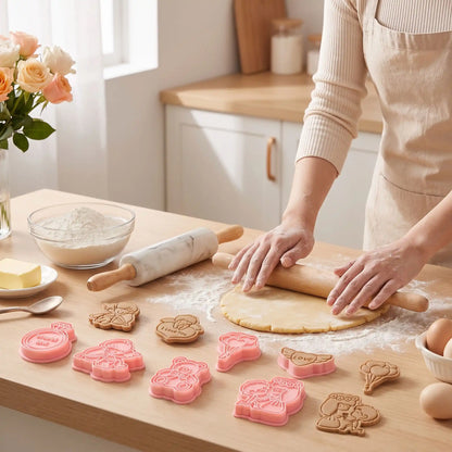 Femme étale pâte biscuit avec Emporte piece pour biscuits