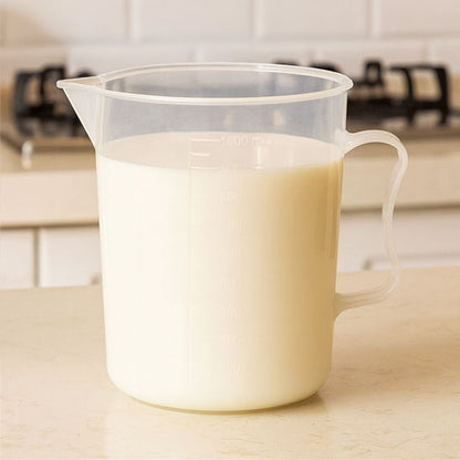 lait dans verre doseur