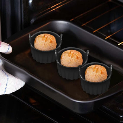 moule muffin couleur noir dans four