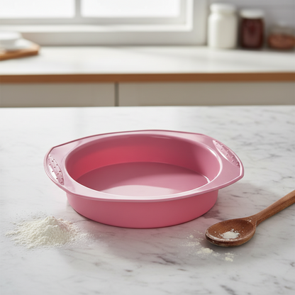 Moule silicone rond sur table marbre avec cuillère