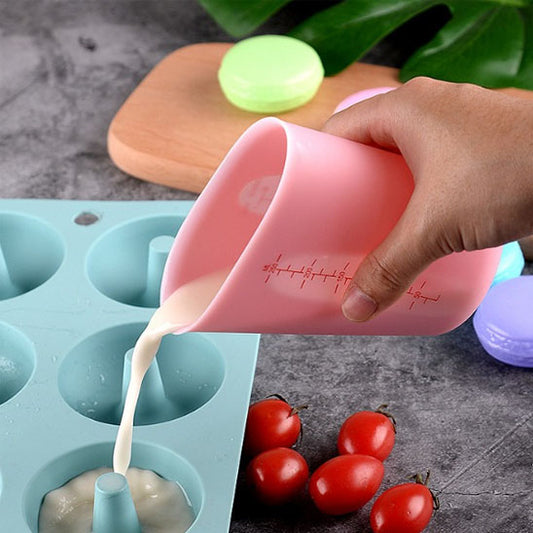 versement preparation avec verre mesureur rose